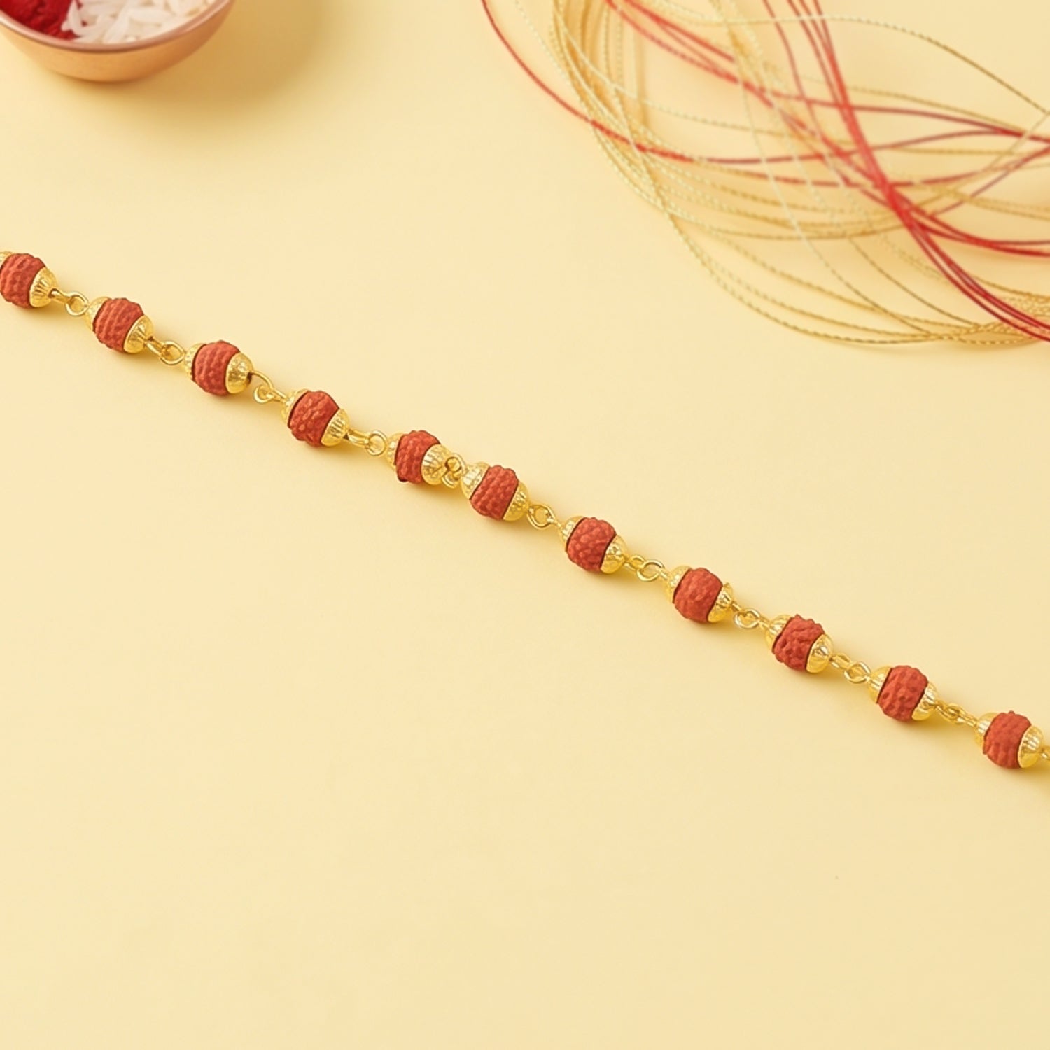 Rudraksha Bead Bracelet Rakhi Gold-plated Cap Beads Rakhi For Brother (1 Pc)